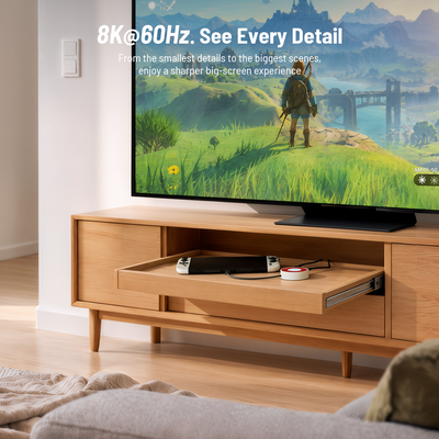 Antank S6 white portable hub in wooden cabinet, white handheld console streaming game on big television screen